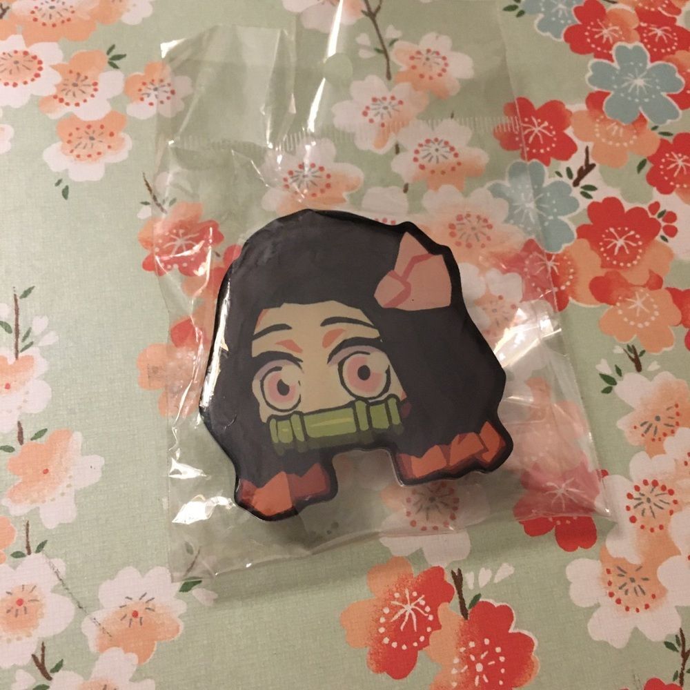 Demon Slayer Nezuko Phone Holder accessory
from ny comic con Never use
